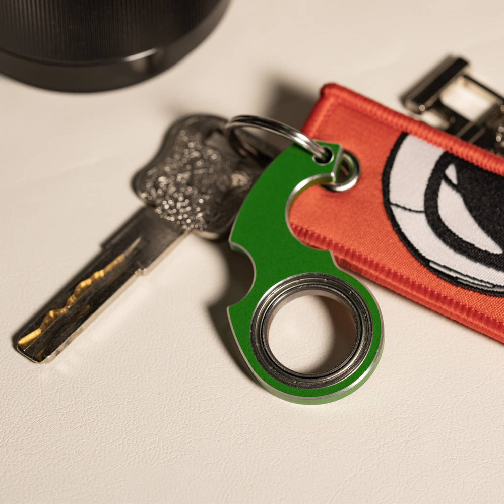 メタルスピナーキーチェーン – ストレス解消＆毎日の持ち歩きに最適なスピニングキーチェーンフィジェット | 滑らかな回転デザイン